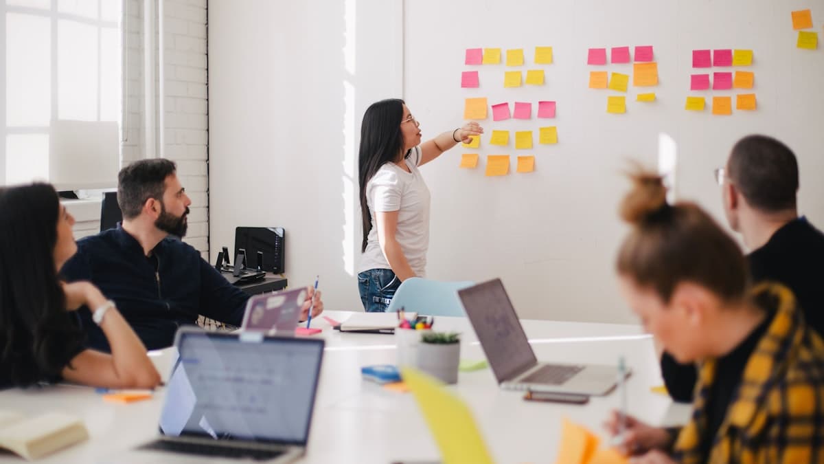 Business team reviewing AI transformation strategy documents
